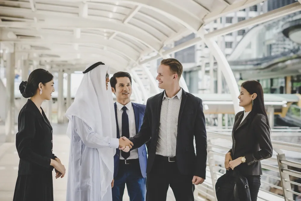 Diverse business team shaking hands